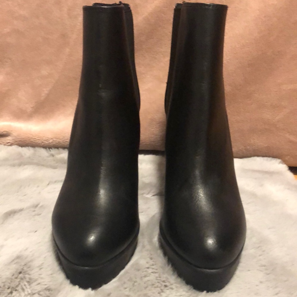 Never worn black boots